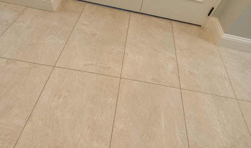 Clean beige tile floor after cleaning